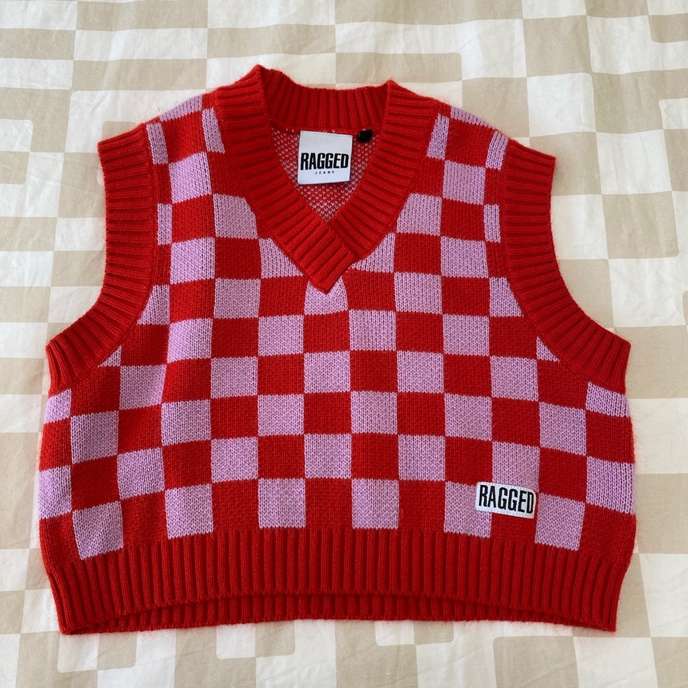Ragged priest sweater vest